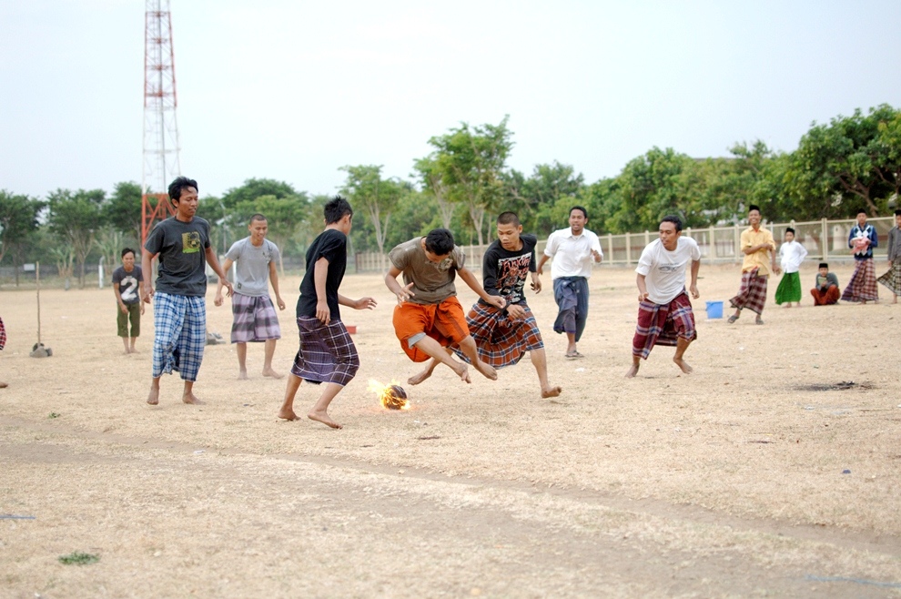 ***EXCLUSIVE*** KEDIRI, INDONESIA - OCTOBER 7: Students play Fire Football at the boarding school Lirboyo on October 7, 2012 in Kediri, Indonesia. THE PREMIER League boasts some of the hottest stars in the world &ndash; but they&rsquo;ve got nothing on these fiery