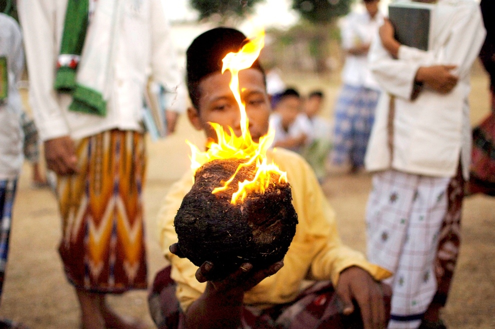 ***EXCLUSIVE*** KEDIRI, INDONESIA - OCTOBER 3: Students play Fire Football at the boarding school Lirboyo on October 3, 2012 in Kediri, Indonesia. THE PREMIER League boasts some of the hottest stars in the world &ndash; but they&rsquo;ve got nothing on these fiery